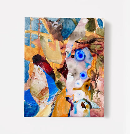 Between Stone and Water, an abstract collage on canvas with blue, ochre, pink and olive layers and vivid blue circular marks.
